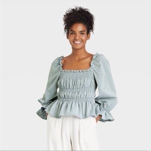 Balloon 3/4 Sleeve Smocked Peplum Top